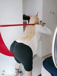 darkwaifutrap, power (chainsaw man), chainsaw man, real life, highres,  1boy, ass, blonde hair, cosplay, from behind, horns, huge ass, leaning,  leaning forward, long hair, pants, photo (medium), power (chainsaw man)  (cosplay), scythe,