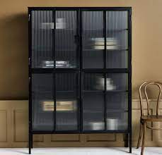 tall black iron rippled door cabinet by