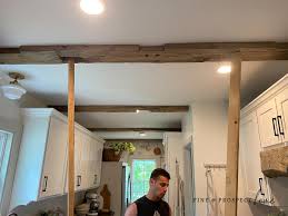 cut down and install reclaimed beams