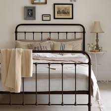 Neutral Country Bedroom With Iron Bed