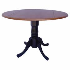 This extendable round table looks extra chic thanks to its contrasting pedestal. 37 42 In Kitchen Dining Room Tables Hayneedle