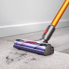 a cordless dyson vacuum cleaner is on