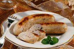 What do Cajuns eat with boudin?