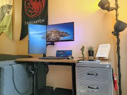 This desk provides 1 open shelf for easily accessible items with plenty of storage to assist with office clutter. Work From Home Office With New Under Desk Shelf Workspaces