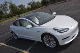 The model 3 performance uses a twin motor setup that runs one motor on the front axle and one on the rear. How To Get A Used Tesla Model 3 Where And How Much 1reddrop