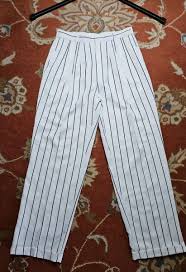 white pinstripe pleated pants w cuffs