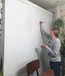 painting a birch tree mural on our