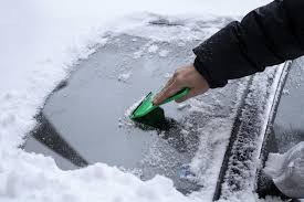 removing ice safely off your windshield