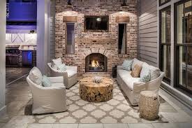 Covered Patio With Red Brick Fireplace
