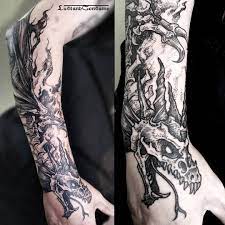 Dragones tatoo brazo