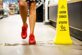how wet floor signs impact a slip and