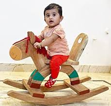 pure neem wooden swinging horse toy