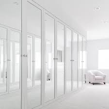 Mirrors aren't just designed to add a decorative touch to an interior. Built In Closets With Mirrors Build A Closet Mirrored Wardrobe Doors Bedroom Closet Design