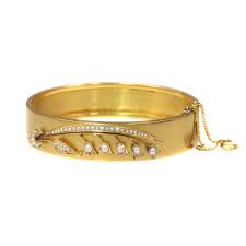 antique gold bangle with lily of the