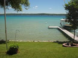 torch lake lakefront cote with large