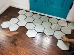 tile rug within a hardwood floor