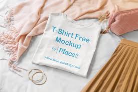 folded t shirt mockup surrounded by