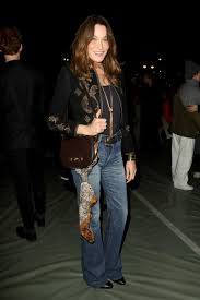 Carla bruni is popular as italian singer as well as a songwriter who already composed many songs and she also work as a model before. Carla Bruni Show Us How To Wear This Fall S Ultimate Denim Trend Vogue Paris