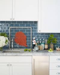 blue subway tiles with white grout
