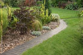 Grass And Curved Brick Paving Path