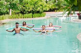 floating noodles in swimming pool of hotel