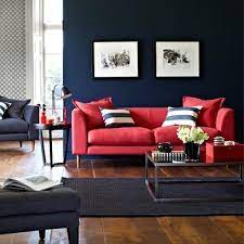Red Sofa With Dark Wood Floors