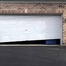 j m garage door repair 109e 17th st