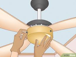 replace a light bulb in a ceiling fan