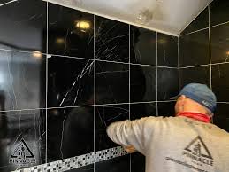 black marble tile shower restoration