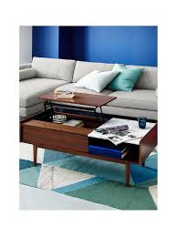 For a natural take, opt for wood, or go with brass, chrome or gold to bring some shine to the space. West Elm Mid Century Pop Up Storage Coffee Table At John Lewis Partners
