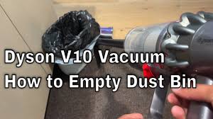 dyson v10 vacuum how to empty