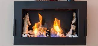 how to keep fireplace glass clean