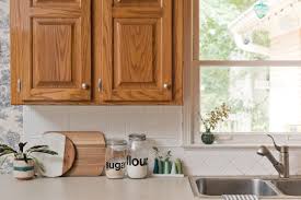 Mix a 50:50 solution of vinegar and warm water in a spray bottle. How To Clean Greasy Cabinets In Your Kitchen Kitchn