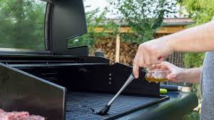 grill grates to a seasoned oil lather