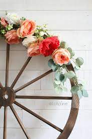 What an ingenious idea it is. Easy To Make Floral Summer Wagon Wheel Wreath Lolly Jane