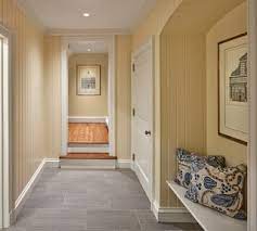 75 gray floor hallway with yellow walls