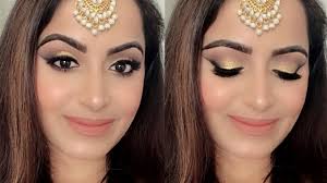 golden indian wedding guest makeup