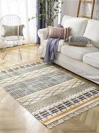 geometric pattern fringe trim rug