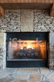 Gas Fireplace With Stone Surround Stock