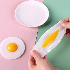 1 stück klebrige tpr gummi eier quetschen küche lebensmittel spielzeug  vorgeben spielen kochen spiegelei omelett knebel witz kinder stress abbauen  spielzeug sztlv | Fruugo DE