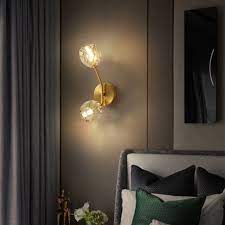 brass branch wall light minimalistic