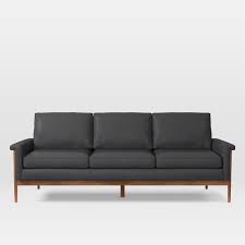 these exposed wood frame sofas are a