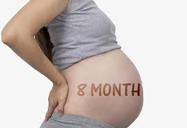 8 months pregnant symptoms t