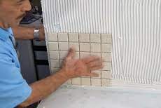 how to lay ceramic tile over concrete