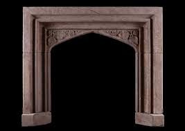 A Carved Stone Fireplace In The Gothic