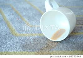 coffee spilled on gray color carpet