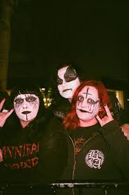 black metal fans in full corpse paint