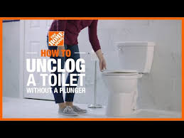 to unclog a toilet without a plunger
