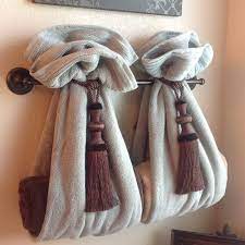 A shower, a sink and a toilet. Decorative Bathroom Towels Ideas Bathroom Towel Decor Decorative Bath Towels Hang Towels In Bathroom