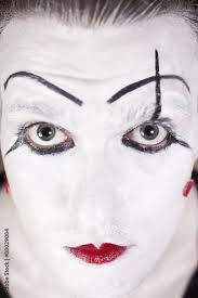 mime face with theatrical makeup stock